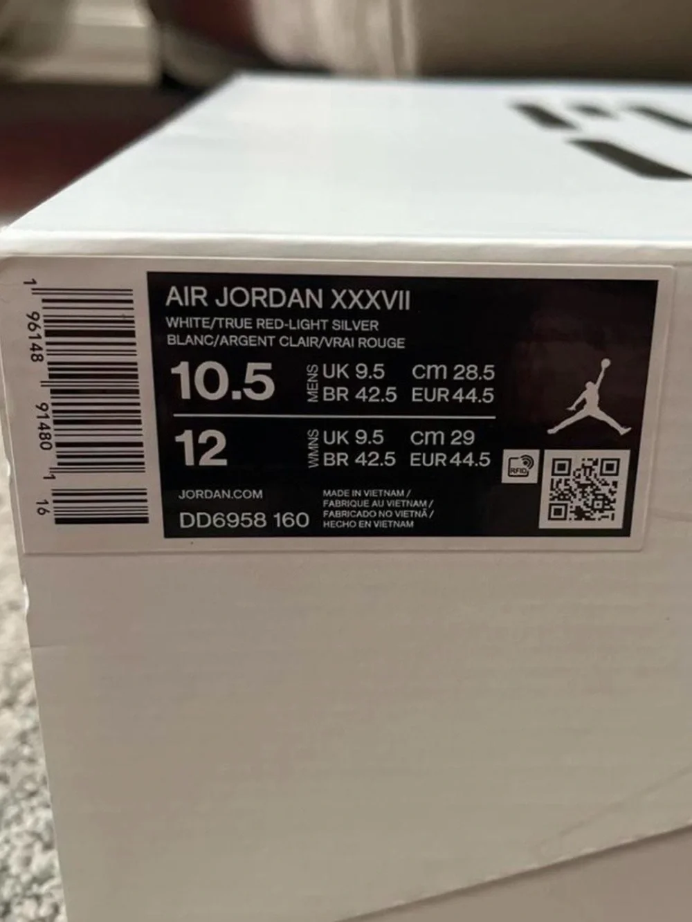 Jordan White and Red Sneakers with Multicolor Tongue